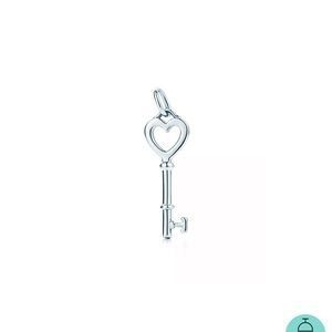 Tiffany and Co Authentic Heart Key Mini, chain is not Tiffany and Co.
